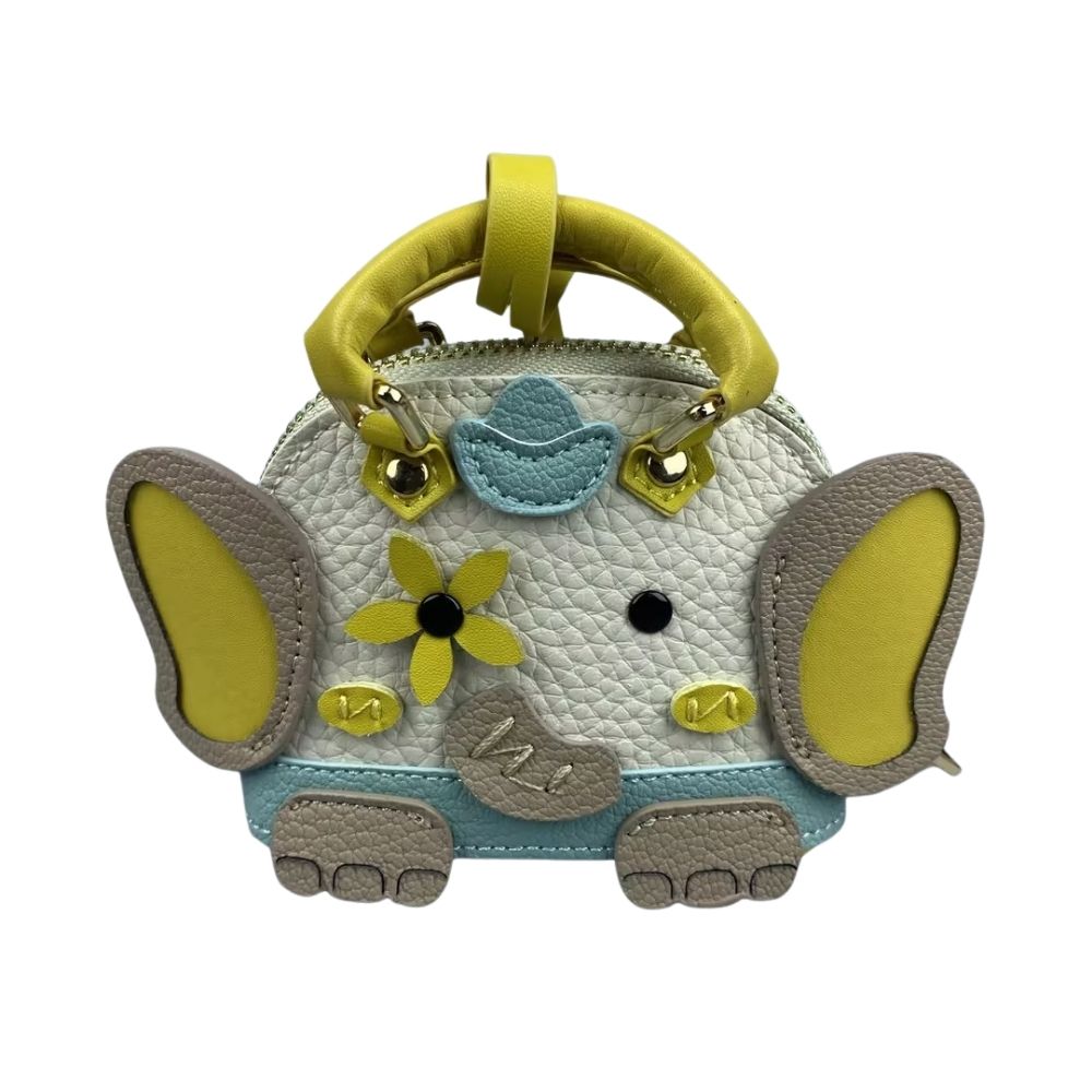 Handcrafted Genuine Lambskin Animal Charm A timeless miniature sculpture for your keys or bag! Meticulously hand-sculpted from buttery-soft lambskin leather, this 3D elephant or whale charm (7×6×2.5cm) combines artistry with everyday elegance. Key Detail