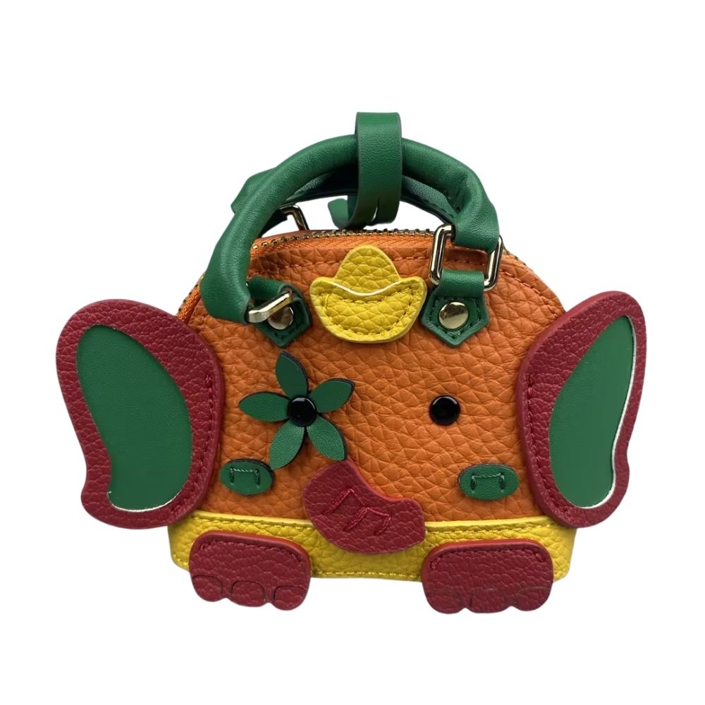 Handcrafted Genuine Lambskin Animal Charm A timeless miniature sculpture for your keys or bag! Meticulously hand-sculpted from buttery-soft lambskin leather, this 3D elephant or whale charm (7×6×2.5cm) combines artistry with everyday elegance. Key Detail