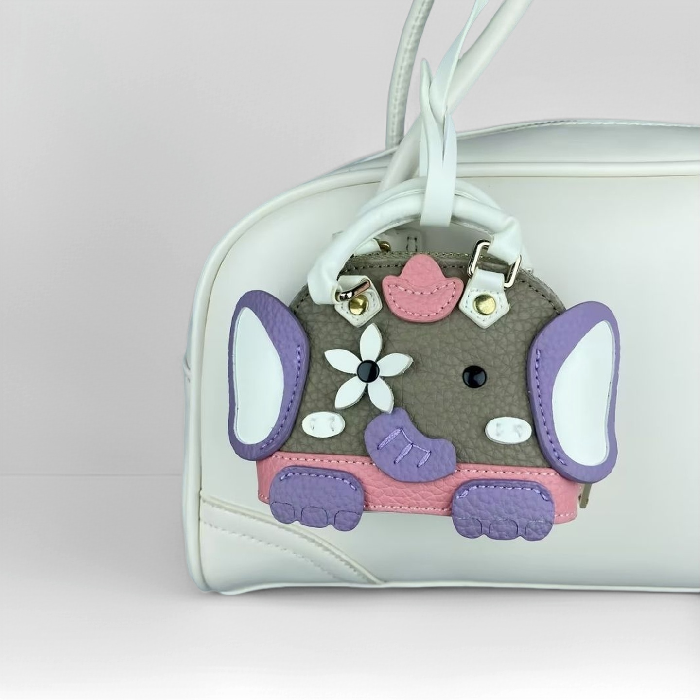Handcrafted Genuine Lambskin Animal Charm A timeless miniature sculpture for your keys or bag! Meticulously hand-sculpted from buttery-soft lambskin leather, this 3D elephant or whale charm (7×6×2.5cm) combines artistry with everyday elegance. Key Detail
