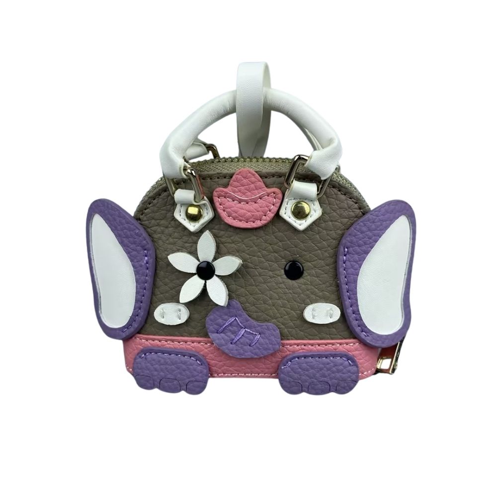 Handcrafted Genuine Lambskin Animal Charm A timeless miniature sculpture for your keys or bag! Meticulously hand-sculpted from buttery-soft lambskin leather, this 3D elephant or whale charm (7×6×2.5cm) combines artistry with everyday elegance. Key Detail
