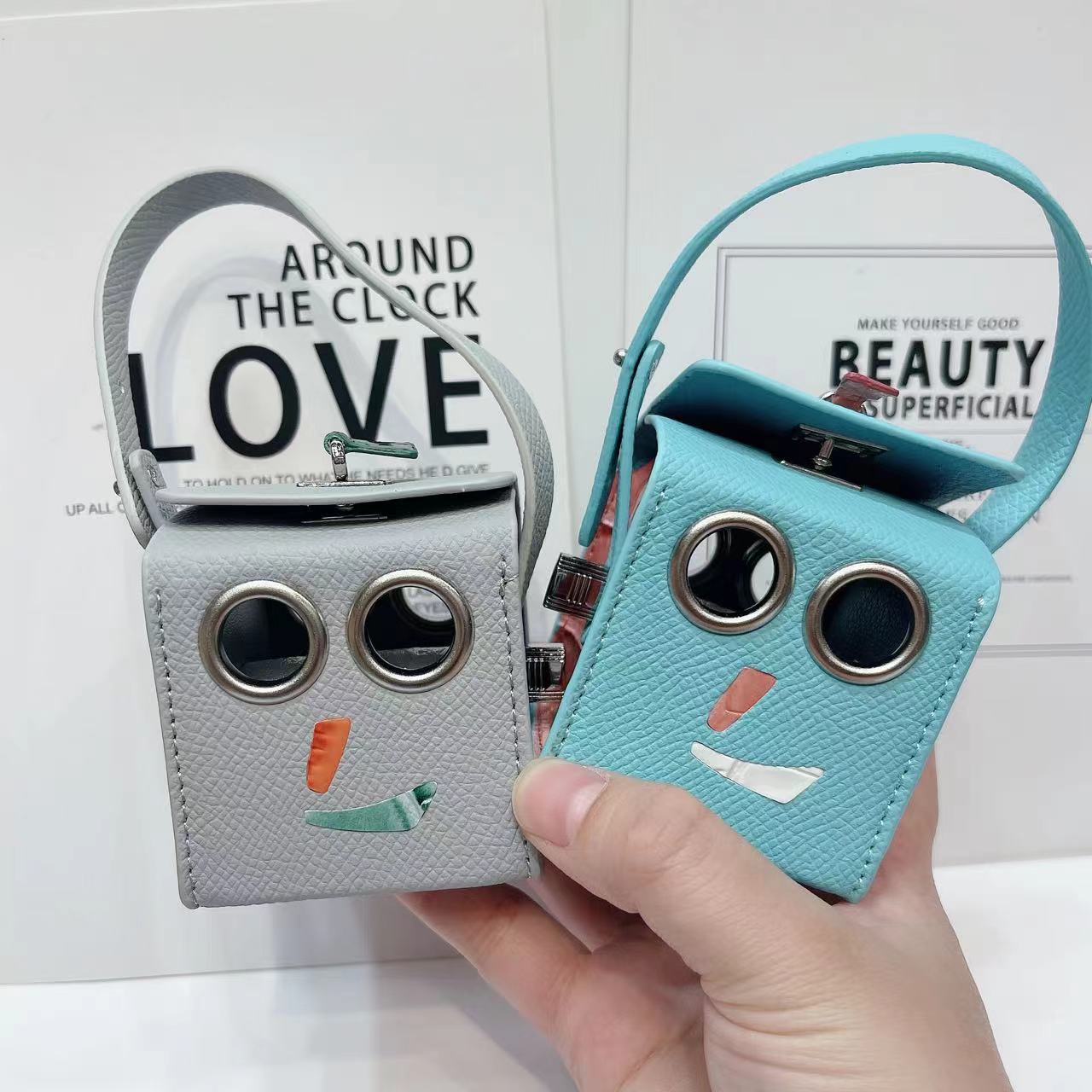Petit H ロボットミニバッグ_高級ロボットバッグ、ミニバッグ、スマイルフェイス