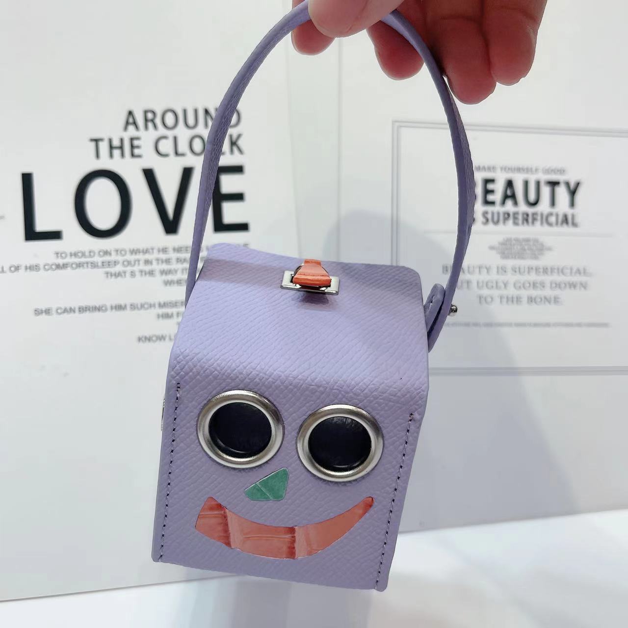 Petit H ロボットミニバッグ_高級ロボットバッグ、ミニバッグ、スマイルフェイス