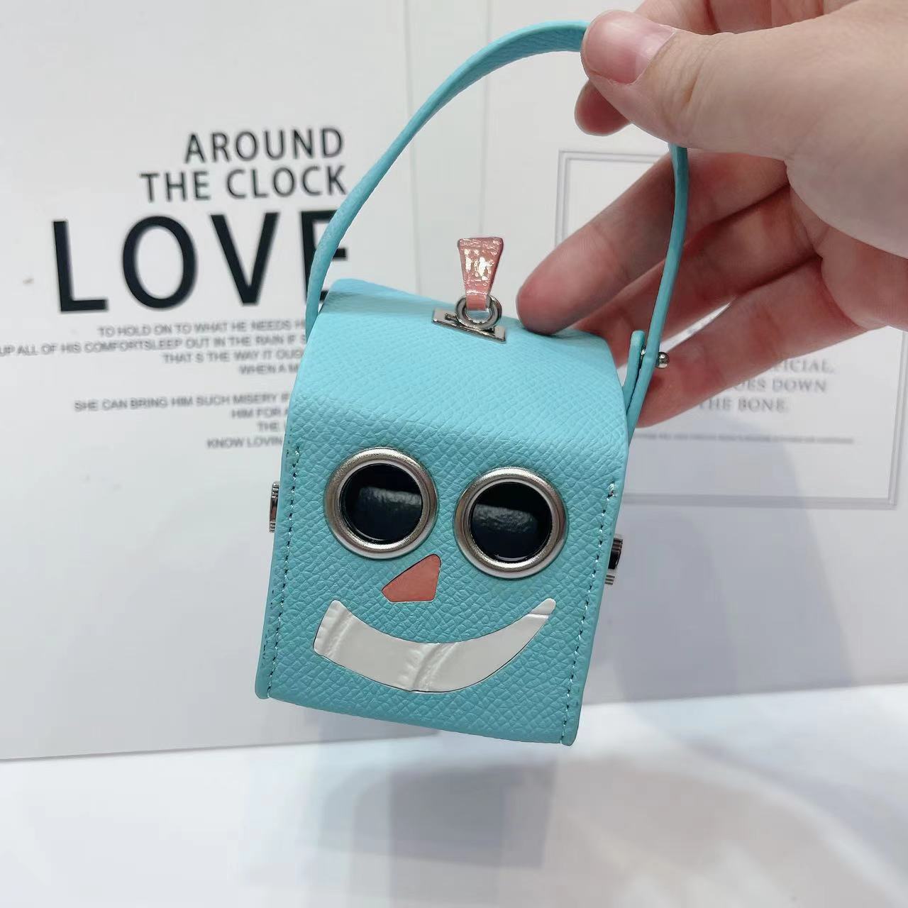 Petit H ロボットミニバッグ_高級ロボットバッグ、ミニバッグ、スマイルフェイス