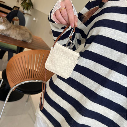 The first layer of cowhide neck red envelope earphone bag is versatile, exquisite clip, storage change bag, Korean version mini card bag.