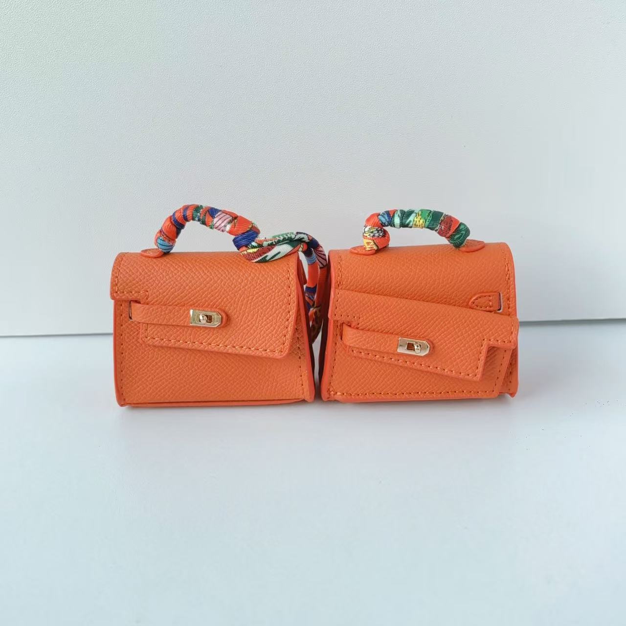 Mini double-sided irregular bag pendant bluetooth headset protective case new creative car pendant