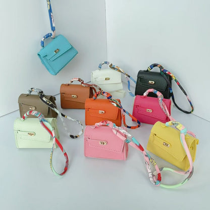 Mini double-sided irregular bag pendant bluetooth headset protective case new creative car pendant