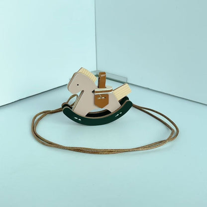 Retro pony leather Trojan horse handmade pendant ins women's car keychain pendant rocking horse bag pendant pu