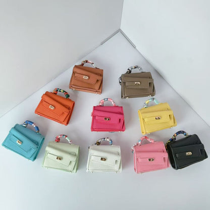 Mini double-sided irregular bag pendant bluetooth headset protective case new creative car pendant