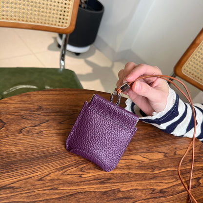 The first layer of cowhide neck red envelope earphone bag is versatile, exquisite clip, storage change bag, Korean version mini card bag.