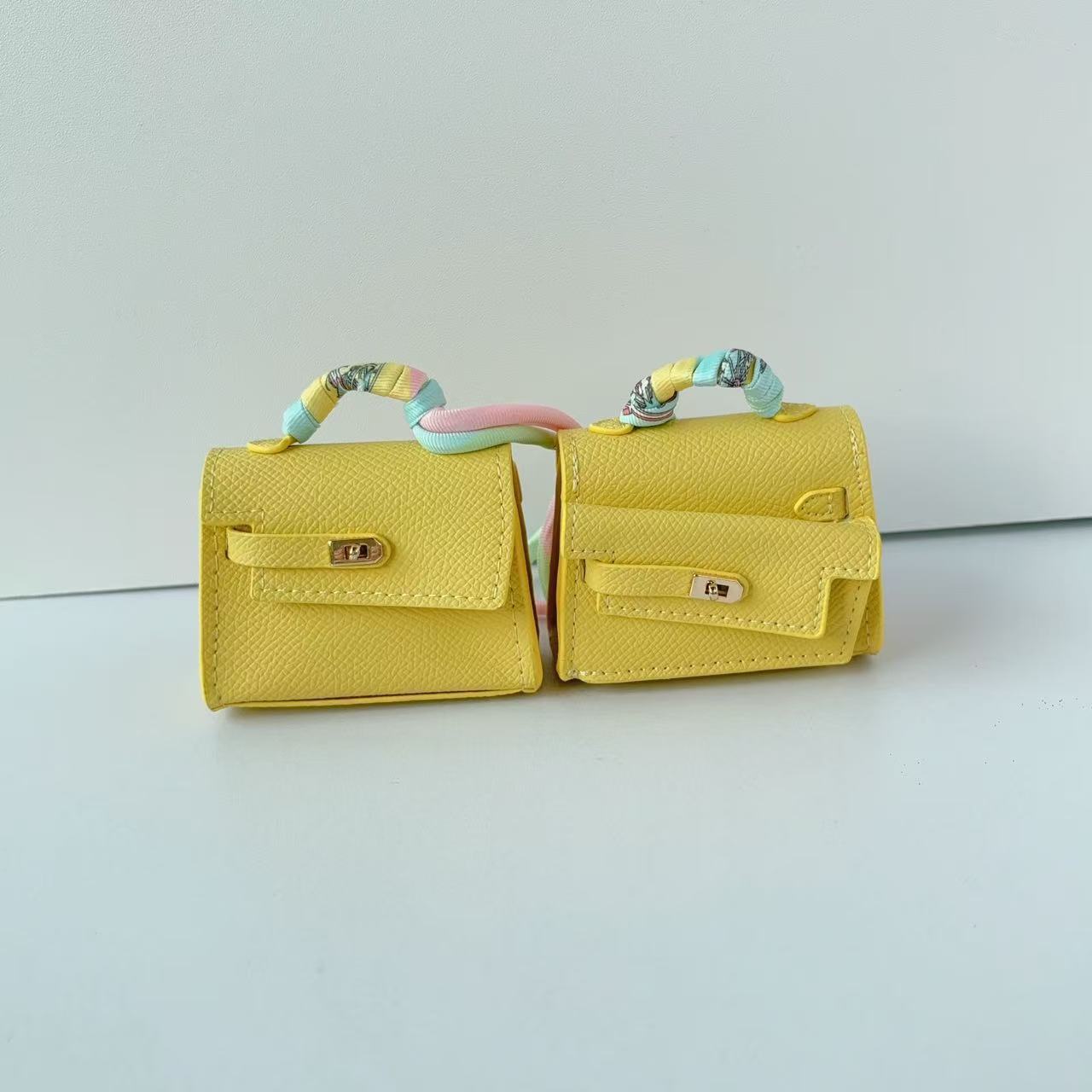 Mini double-sided irregular bag pendant bluetooth headset protective case new creative car pendant