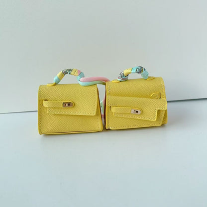 Mini double-sided irregular bag pendant bluetooth headset protective case new creative car pendant