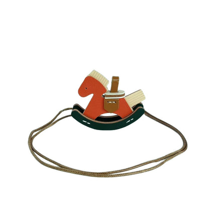 Retro pony leather Trojan horse handmade pendant ins women's car keychain pendant rocking horse bag pendant pu