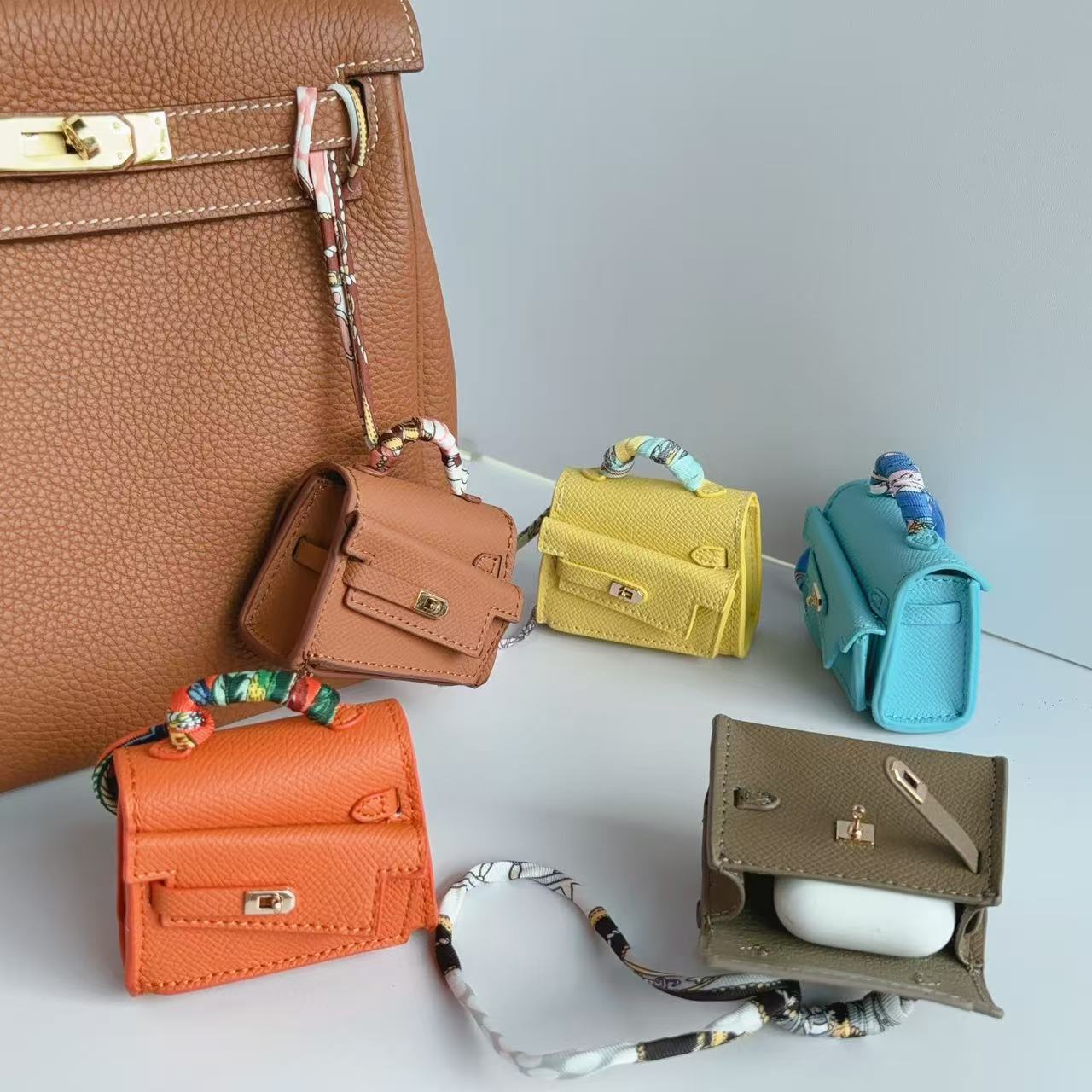 Mini double-sided irregular bag pendant bluetooth headset protective case new creative car pendant