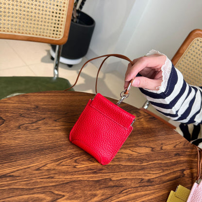 The first layer of cowhide neck red envelope earphone bag is versatile, exquisite clip, storage change bag, Korean version mini card bag.