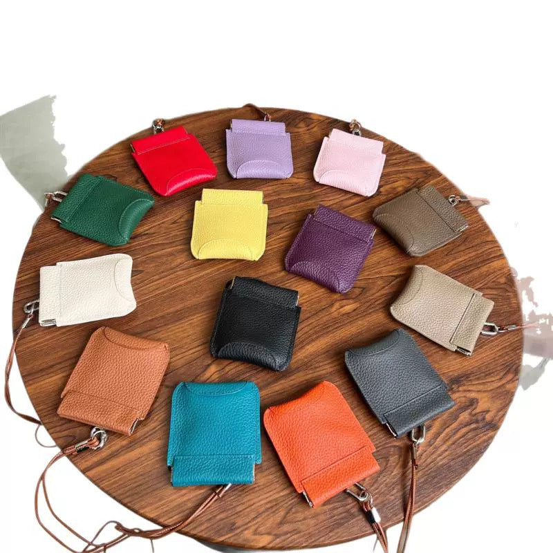 The first layer of cowhide neck red envelope earphone bag is versatile, exquisite clip, storage change bag, Korean version mini card bag.
