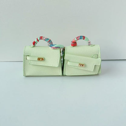 Mini double-sided irregular bag pendant bluetooth headset protective case new creative car pendant