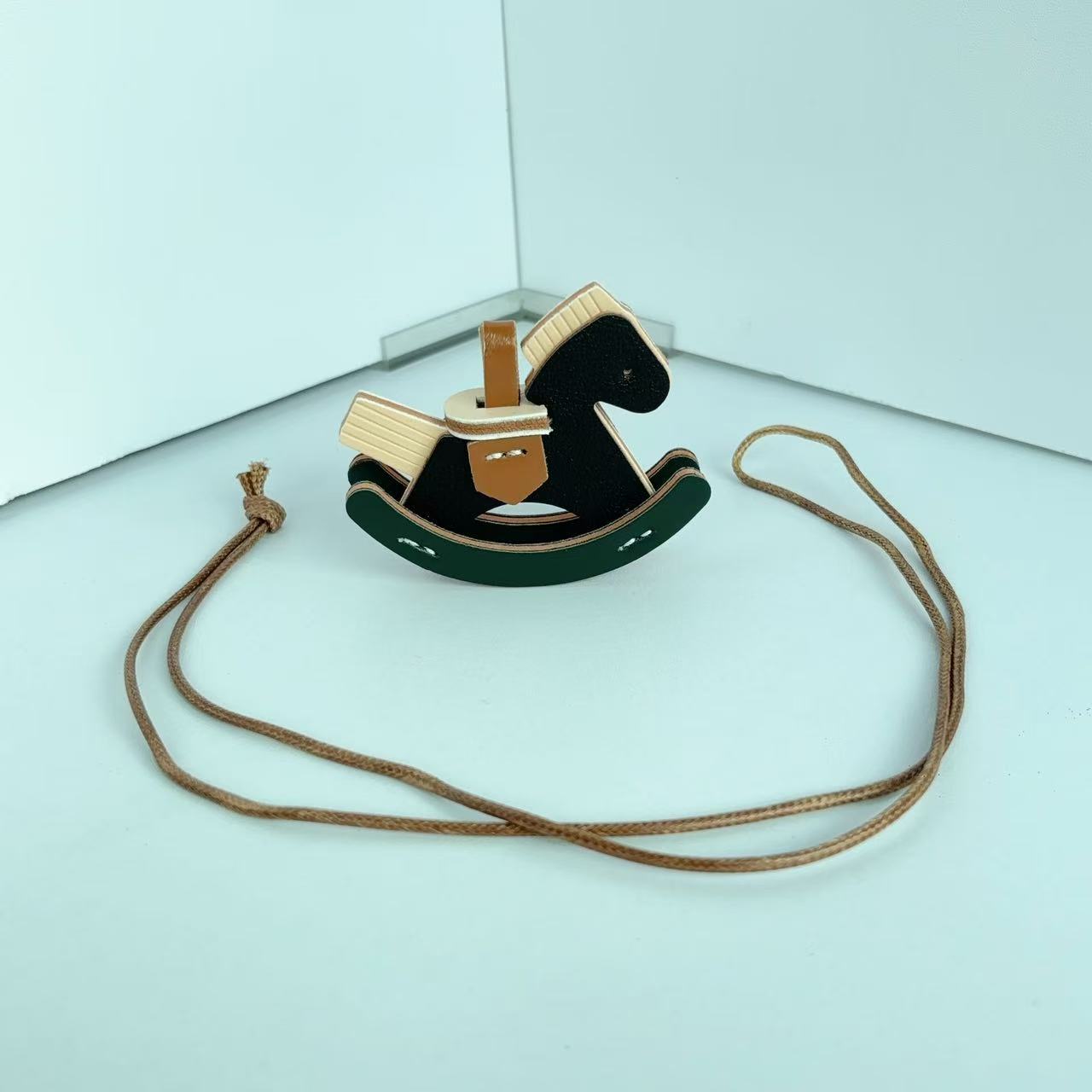 Retro pony leather Trojan horse handmade pendant ins women's car keychain pendant rocking horse bag pendant pu