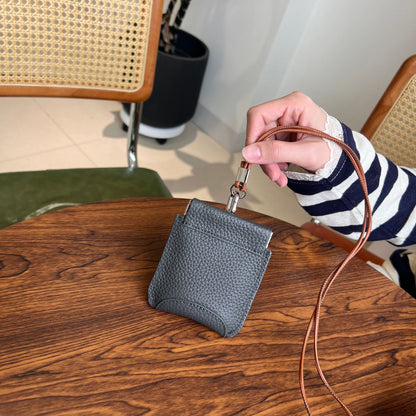 The first layer of cowhide neck red envelope earphone bag is versatile, exquisite clip, storage change bag, Korean version mini card bag.
