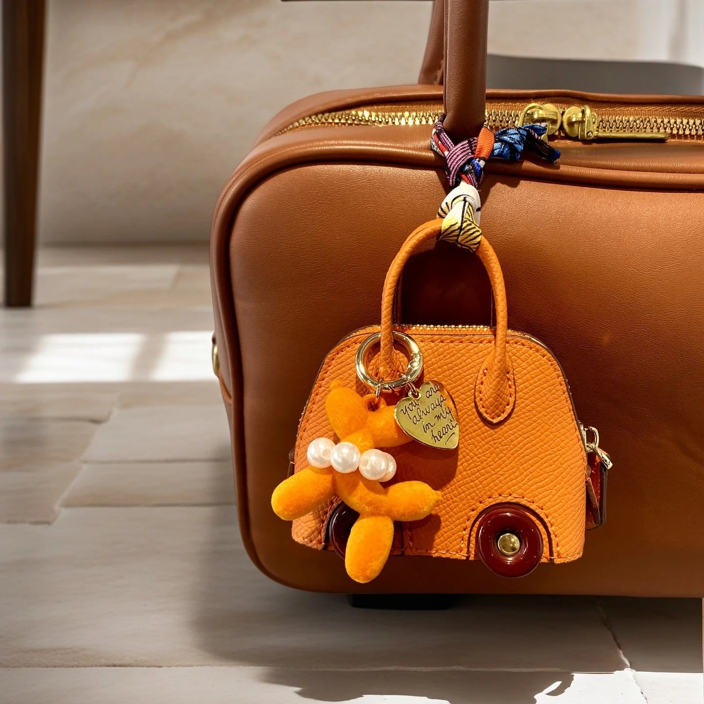Cute PU Leather Mini Wheel Bag Charm with Flocked Balloon Dog Charm-Small Cute Coin Purse Pouch for Earbuds, Cables & Cash/Gift