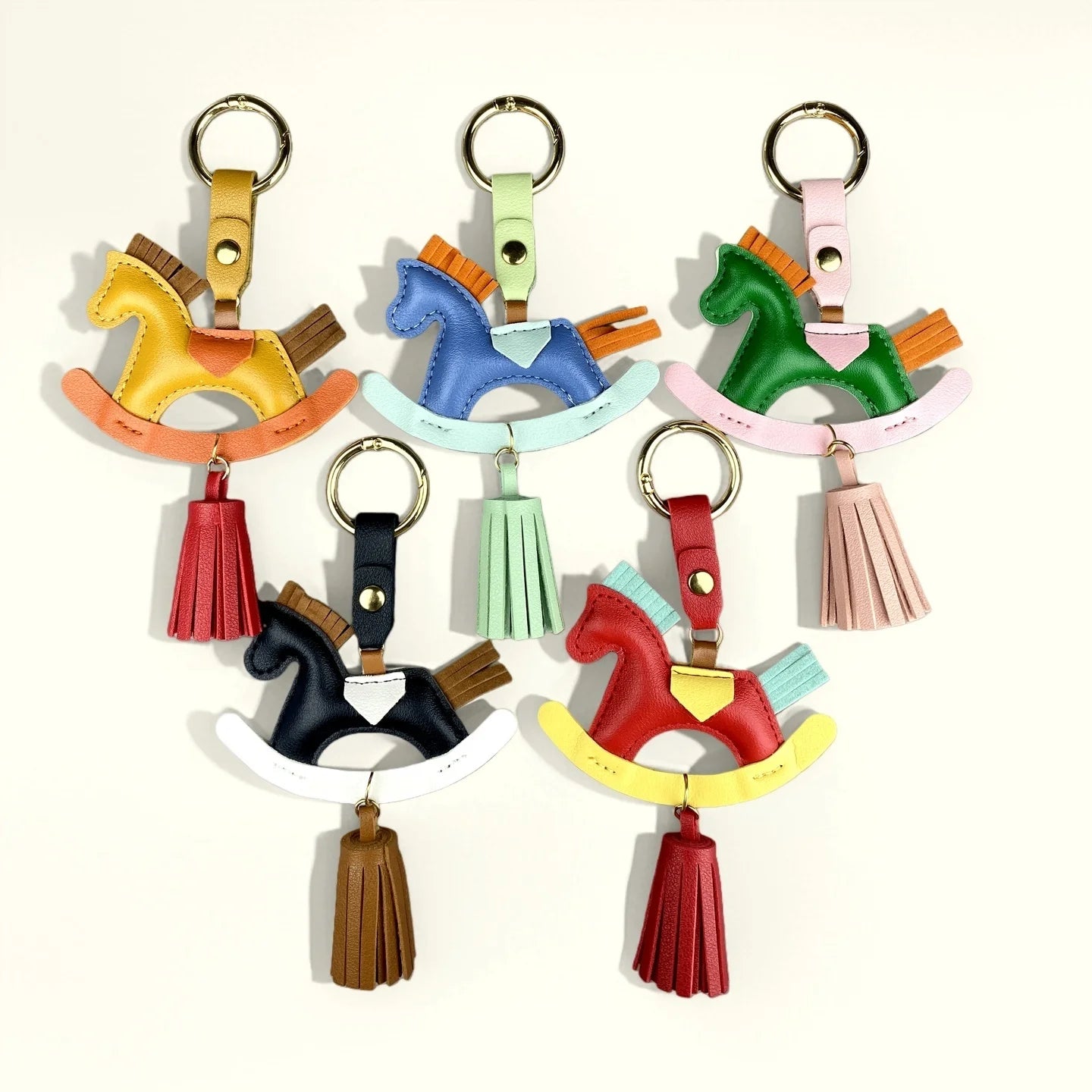 Vibrant PU Leather Rocking Horse Keychain/Bag Charm - Colorful Two-Tone Design with PU Leather Tassel, Cute Bag Charm & Gift