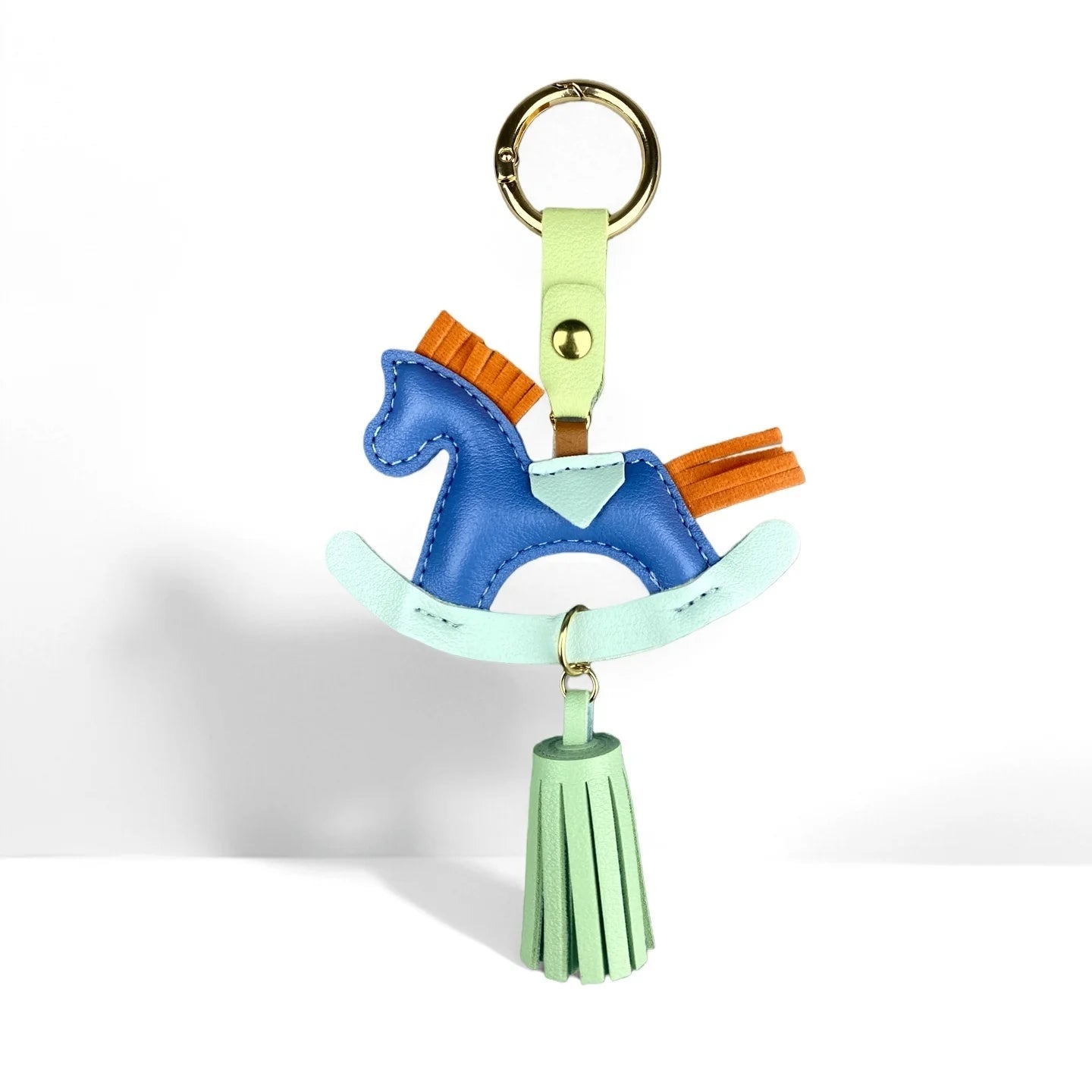 Vibrant PU Leather Rocking Horse Keychain/Bag Charm - Colorful Two-Tone Design with PU Leather Tassel, Cute Bag Charm & Gift