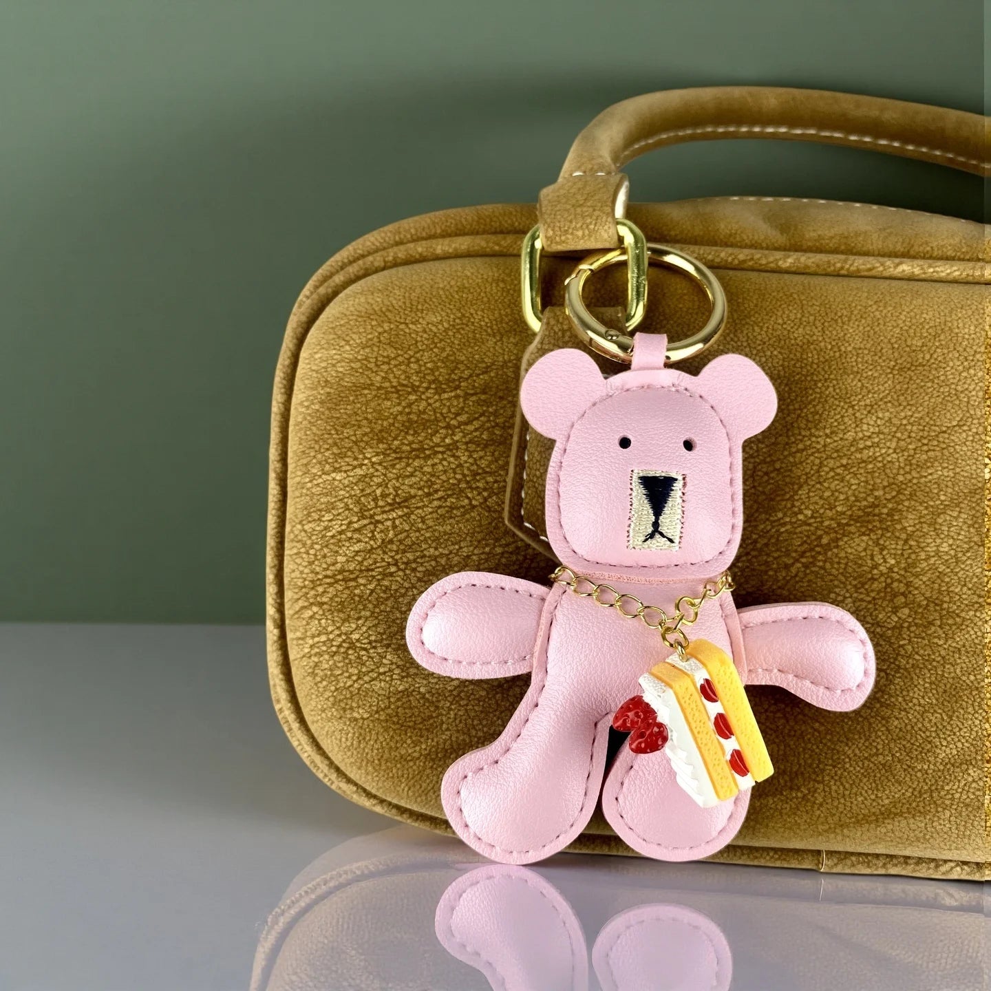 Adorable Lazy PU Leather Bear Keychain with Strawberry Cake Pendant. Cute and Funny Purse Charm- Perfect Relaxing Accessory