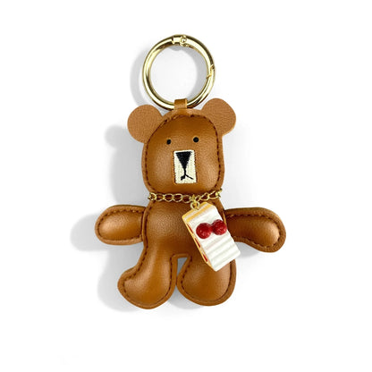 Adorable Lazy PU Leather Bear Keychain with Strawberry Cake Pendant. Cute and Funny Purse Charm- Perfect Relaxing Accessory